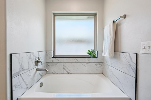 1512 N Kamryn Way, Mustang, OK 73064 - bathroom with a garden tub and healthy amount of natural light
