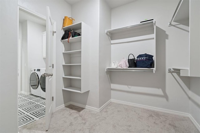1512 N Kamryn Way, Mustang, OK 73064 - walk in closet with carpet and washer and dryer