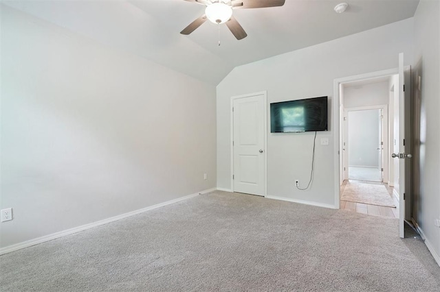 1512 N Kamryn Way, Mustang, OK 73064 - unfurnished bedroom with carpet floors, vaulted ceiling, and ceiling fan