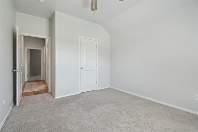 1512 N Kamryn Way, Mustang, OK 73064 - unfurnished bedroom with carpet, lofted ceiling, and ceiling fan