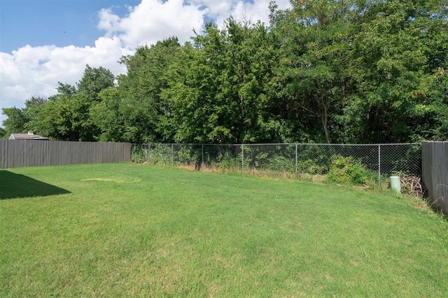 1512 N Kamryn Way, Mustang, OK 73064 - view of fenced backyard