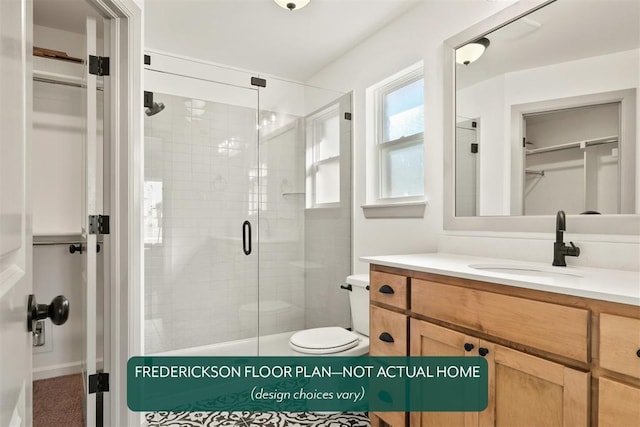15805 Nighthawk Dr, Moore, OK 73170 - full bathroom featuring a walk in closet, vanity, and a stall shower