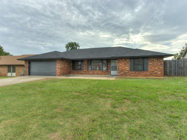 5412 Cloverlawn Dr, Oklahoma City, OK 73135 - single story home featuring an attached garage, brick siding, and concrete driveway