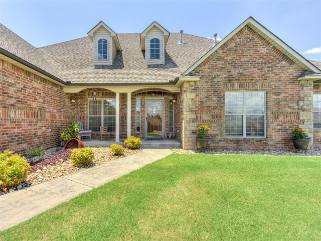 559 Silver Tree Cir, Choctaw, OK 73020 - view of front facade with brick siding, a shingled roof, and a front lawn