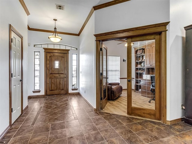 559 Silver Tree Cir, Choctaw, OK 73020 - foyer entrance featuring ornamental molding and a ceiling fan