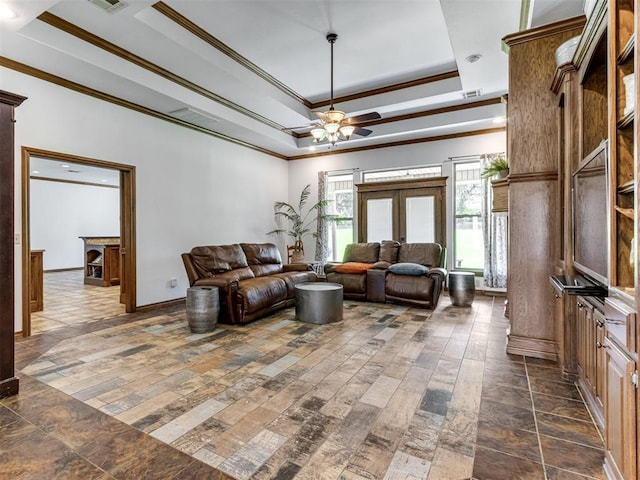 559 Silver Tree Cir, Choctaw, OK 73020 - living area featuring crown molding, a ceiling fan, and a raised ceiling