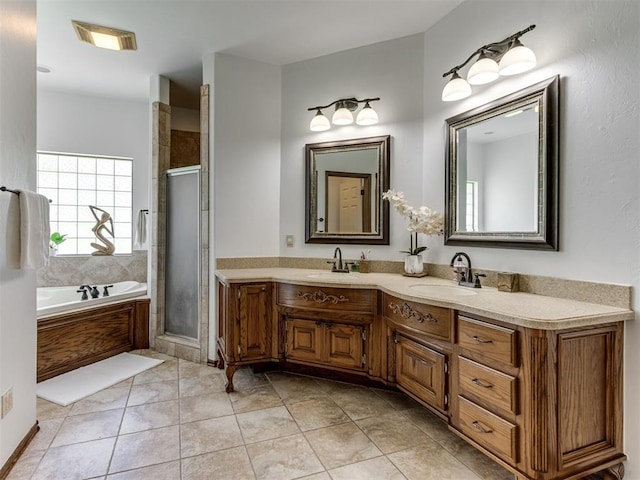 559 Silver Tree Cir, Choctaw, OK 73020 - full bathroom featuring a shower stall, a bath, double vanity, and tile patterned floors