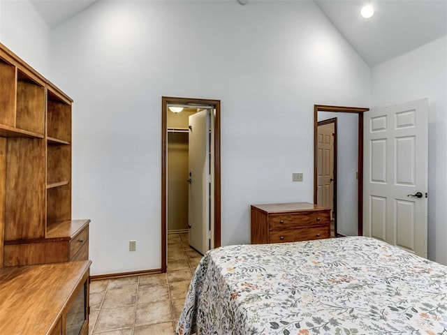 559 Silver Tree Cir, Choctaw, OK 73020 - bedroom with high vaulted ceiling and a spacious closet