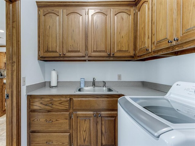 559 Silver Tree Cir, Choctaw, OK 73020 - laundry area with cabinet space and washer and clothes dryer