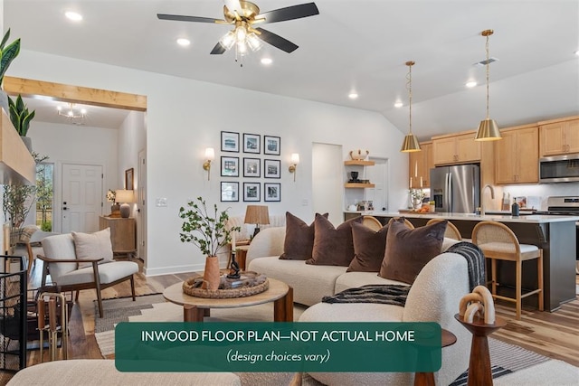 449 Vista Dr, Yukon, OK 73099 - living room featuring light wood-style floors, a ceiling fan, and lofted ceiling