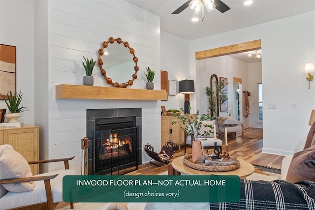 449 Vista Dr, Yukon, OK 73099 - living room featuring wood finished floors, a fireplace, and a ceiling fan