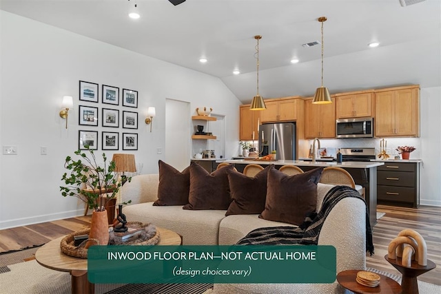 449 Vista Dr, Yukon, OK 73099 - living area featuring dark wood finished floors, lofted ceiling, and recessed lighting