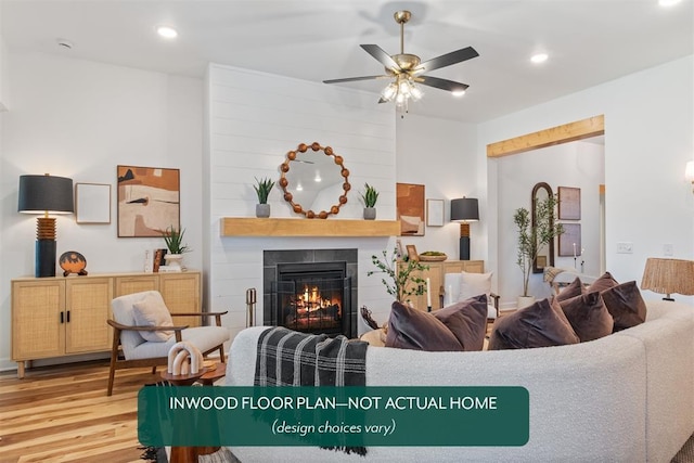 449 Vista Dr, Yukon, OK 73099 - living room with wood finished floors, ceiling fan, a large fireplace, and recessed lighting