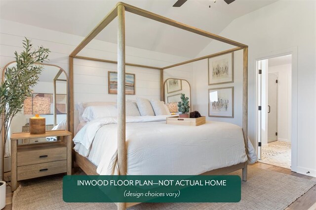 449 Vista Dr, Yukon, OK 73099 - bedroom featuring wood finished floors and vaulted ceiling