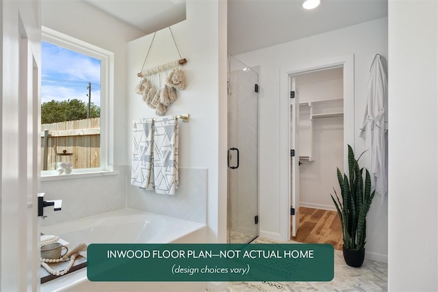 449 Vista Dr, Yukon, OK 73099 - full bathroom with a shower stall, a garden tub, a walk in closet, and wood finished floors