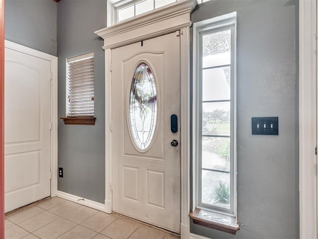 1801 Wagon Trail Blvd, Harrah, OK 73045 - foyer featuring light tile patterned flooring and healthy amount of natural light