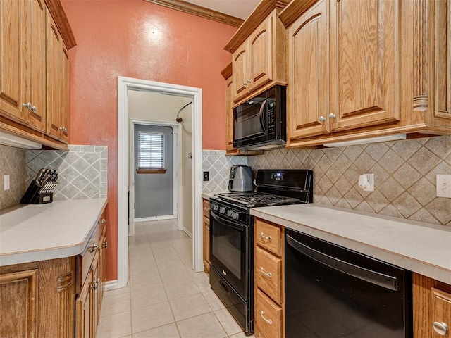 1801 Wagon Trail Blvd, Harrah, OK 73045 - kitchen featuring black appliances, light tile patterned floors, light countertops, and decorative backsplash