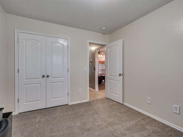 1801 Wagon Trail Blvd, Harrah, OK 73045 - unfurnished bedroom with light colored carpet and a closet
