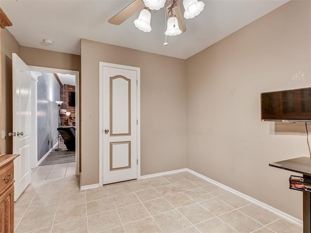 1801 Wagon Trail Blvd, Harrah, OK 73045 - unfurnished dining area with light tile patterned flooring and a ceiling fan