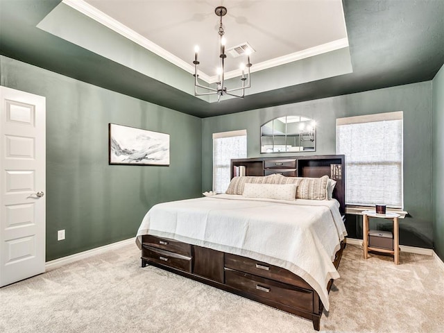 10824 NW 32nd Ter, Yukon, OK 73099 - carpeted bedroom featuring a chandelier, a tray ceiling, and ornamental molding