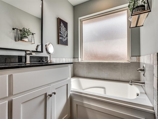 10824 NW 32nd Ter, Yukon, OK 73099 - full bath with vanity and a garden tub