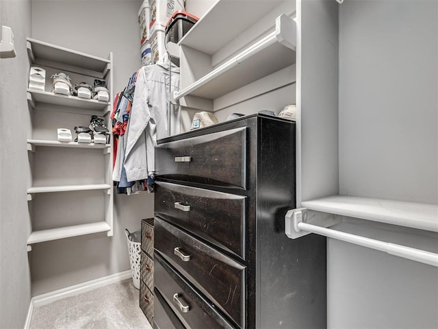 10824 NW 32nd Ter, Yukon, OK 73099 - walk in closet featuring carpet floors