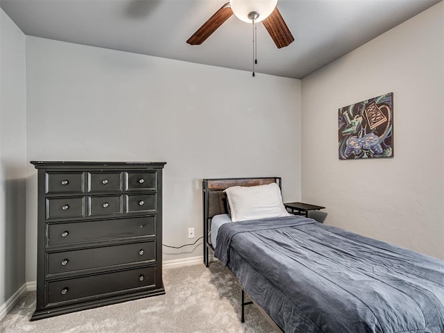 10824 NW 32nd Ter, Yukon, OK 73099 - bedroom with light colored carpet and a ceiling fan