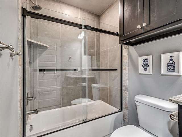 10824 NW 32nd Ter, Yukon, OK 73099 - bathroom featuring toilet and enclosed tub / shower combo
