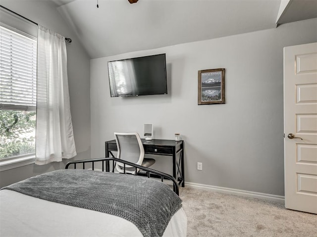 10824 NW 32nd Ter, Yukon, OK 73099 - carpeted bedroom featuring vaulted ceiling and a ceiling fan