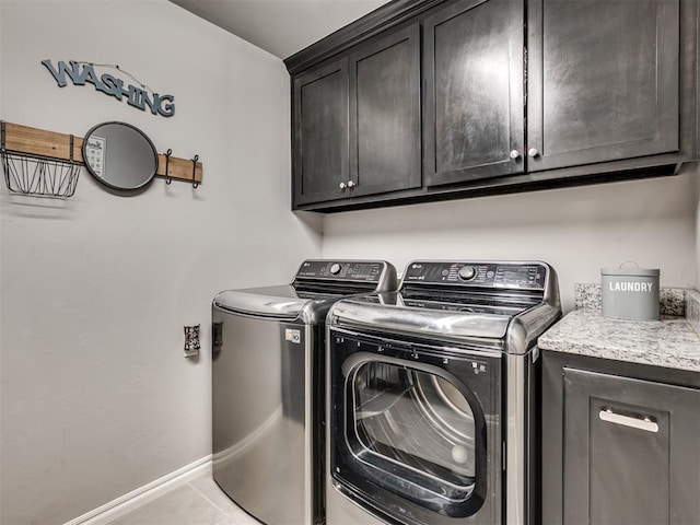 10824 NW 32nd Ter, Yukon, OK 73099 - washroom featuring cabinet space and independent washer and dryer