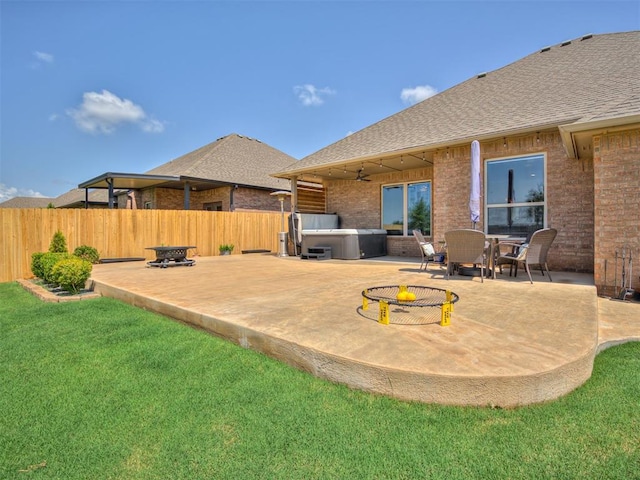 10824 NW 32nd Ter, Yukon, OK 73099 - view of patio / terrace featuring a hot tub