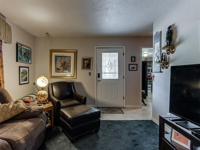 1200 Kingston Dr, Yukon, OK 73099 - carpeted living area with a textured ceiling and baseboards
