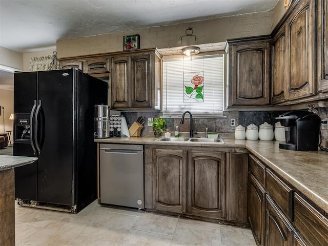 1200 Kingston Dr, Yukon, OK 73099 - kitchen with black refrigerator with ice dispenser, dishwasher, dark brown cabinets, and backsplash