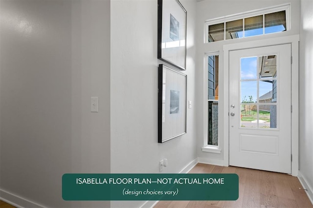 801 Caladium Dr, Yukon, OK 73099 - entryway featuring baseboards and wood finished floors