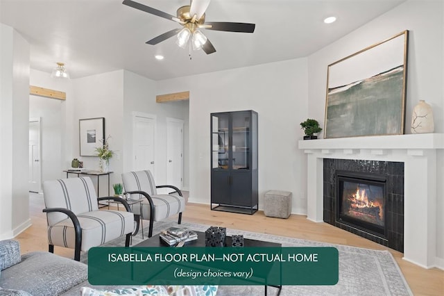 801 Caladium Dr, Yukon, OK 73099 - living area featuring wood finished floors, ceiling fan, a tiled fireplace, and recessed lighting