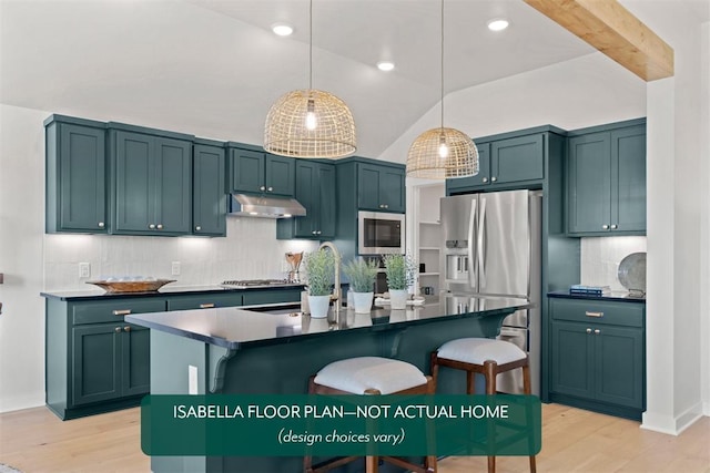 801 Caladium Dr, Yukon, OK 73099 - kitchen featuring under cabinet range hood, appliances with stainless steel finishes, light wood-type flooring, a breakfast bar area, and tasteful backsplash