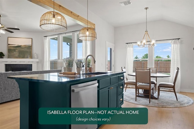 801 Caladium Dr, Yukon, OK 73099 - kitchen featuring stainless steel dishwasher, plenty of natural light, a chandelier, dark countertops, and lofted ceiling