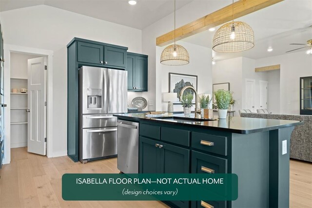 801 Caladium Dr, Yukon, OK 73099 - kitchen featuring stainless steel appliances, dark countertops, light wood-style flooring, hanging light fixtures, and ceiling fan