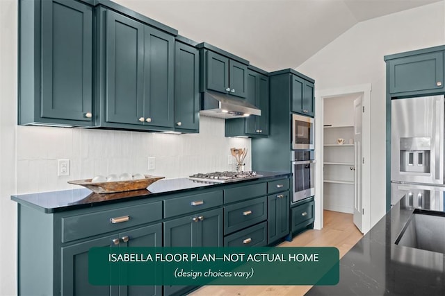 801 Caladium Dr, Yukon, OK 73099 - kitchen with under cabinet range hood, stainless steel appliances, vaulted ceiling, backsplash, and light wood finished floors