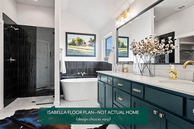 801 Caladium Dr, Yukon, OK 73099 - bathroom featuring double vanity, a freestanding bath, walk in shower, tile patterned flooring, and tile walls