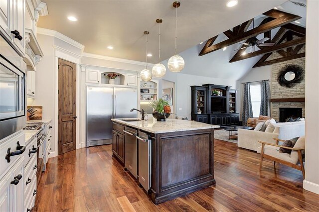 4409 Farm Hill Rd, Norman, OK 73072 - kitchen featuring built in fridge, open shelves, dark brown cabinets, white cabinetry, and recessed lighting