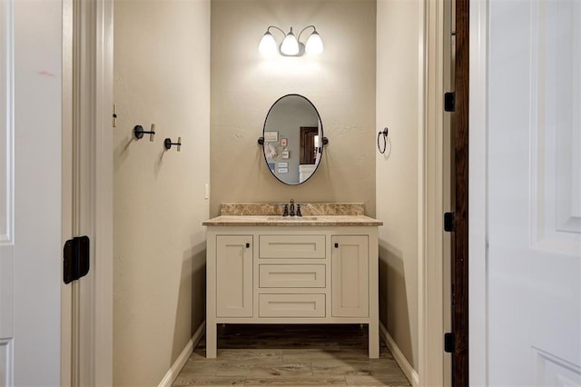 4409 Farm Hill Rd, Norman, OK 73072 - bathroom featuring vanity and wood finished floors