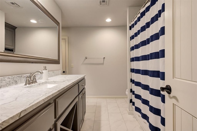 4409 Farm Hill Rd, Norman, OK 73072 - full bath featuring vanity, marble look tiles, recessed lighting, and curtained shower