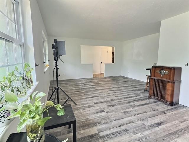 1024 E 12th St, Cushing, OK 74023 - living area with wood finished floors