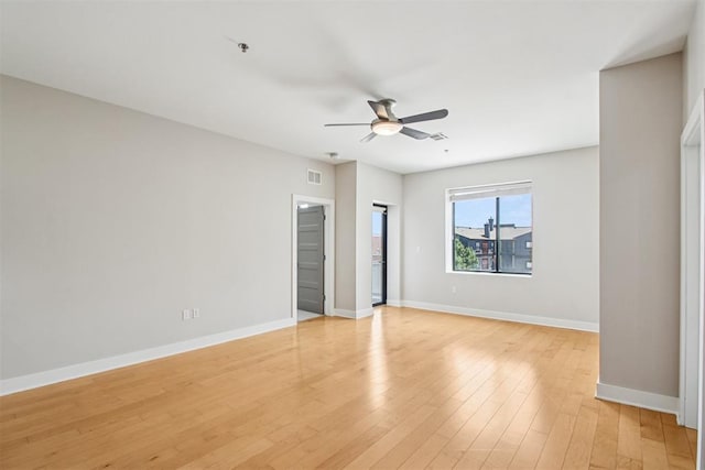 444 N Central Ave Unit 204, Oklahoma City, OK 73104 - spare room featuring a ceiling fan and light wood-style flooring