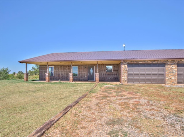 2801 Cobalt Ct, Piedmont, OK 73078 - view of front of home featuring a front yard, an attached garage, driveway, and brick siding