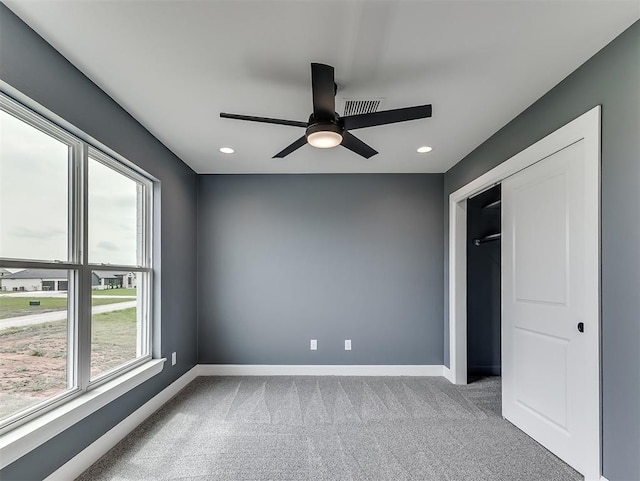 7431 NE Hawk Dr, Piedmont, OK 73078 - unfurnished bedroom with carpet floors, recessed lighting, a ceiling fan, and a closet