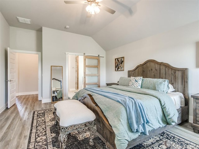 2315 Dixie Dr, Blanchard, OK 73010 - bedroom featuring light wood-type flooring, vaulted ceiling, and ceiling fan