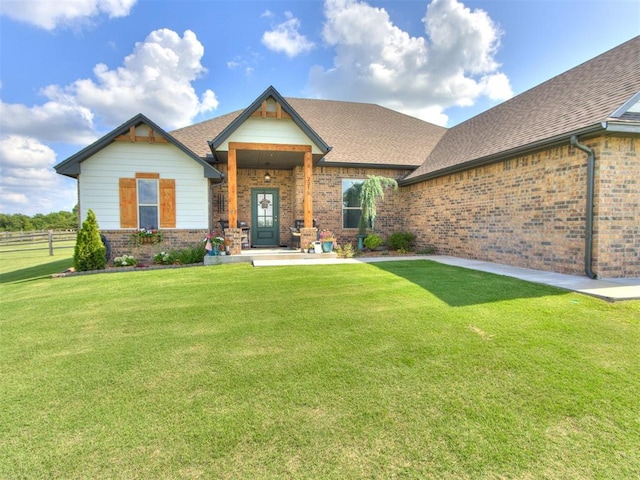 2315 Dixie Dr, Blanchard, OK 73010 - view of front facade with brick siding and roof with shingles