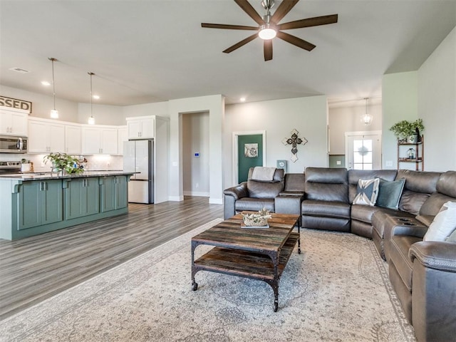 2315 Dixie Dr, Blanchard, OK 73010 - living room with a ceiling fan, light wood-style flooring, and recessed lighting